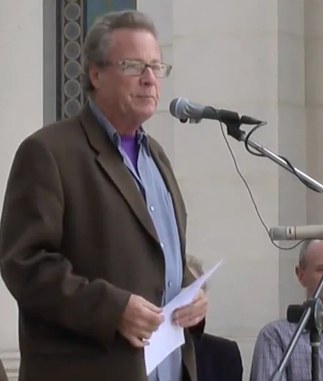 John Heard in 2010, an older man with grey hair at a public event.