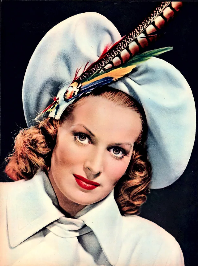 Magazine portrait of Maureen O'Hara from 1947, with wavy red hair.