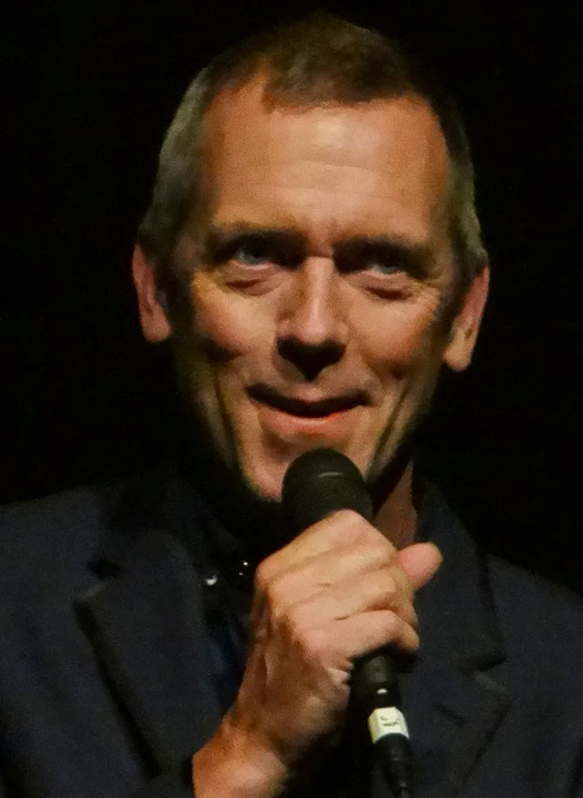 Portrait photograph of the actor Hugh Laurie at a public event in 2012.