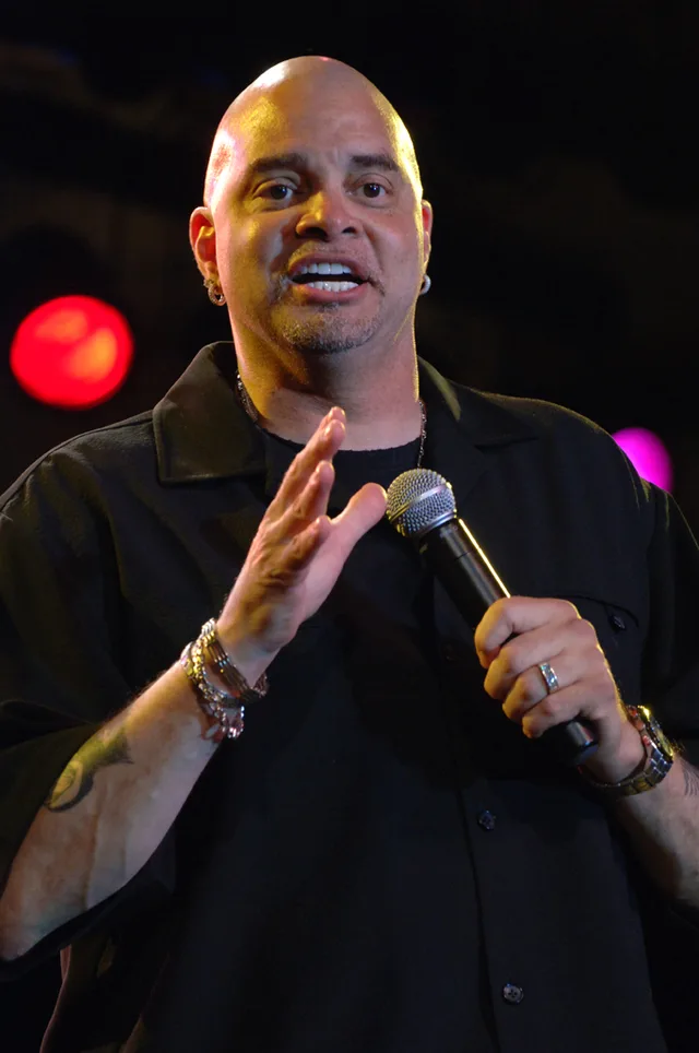 The comedian and actor Sinbad speaking while on a military entertainment visit.