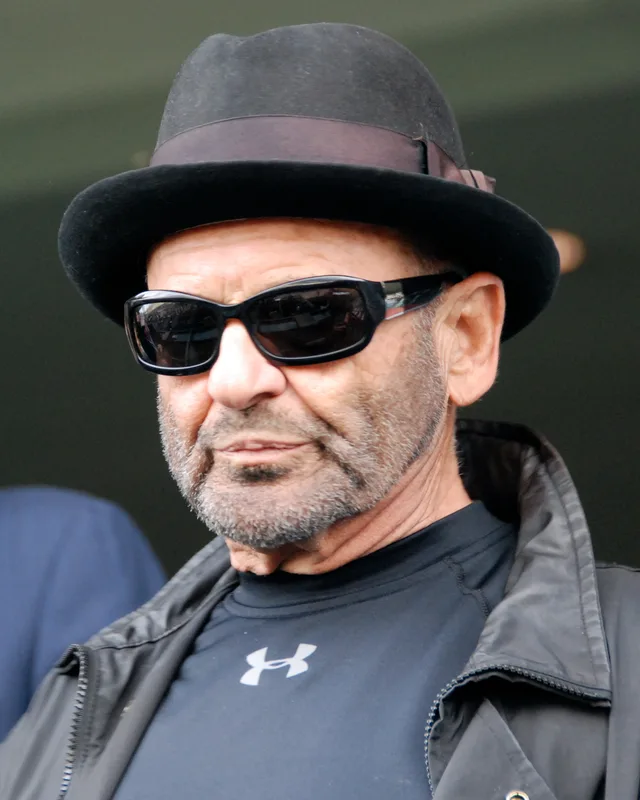 Joe Pesci photographed in 2009, in a dark jacket.