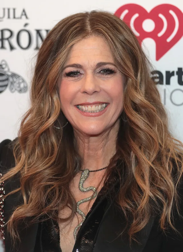 Rita Wilson smiling, photographed at a public event.