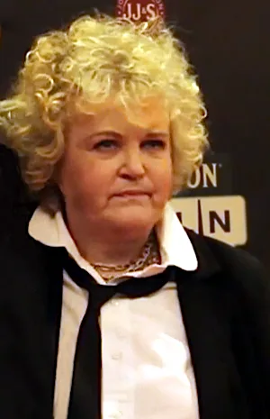 Brenda Fricker in 2014, an older woman with short grey hair smiling at the camera.