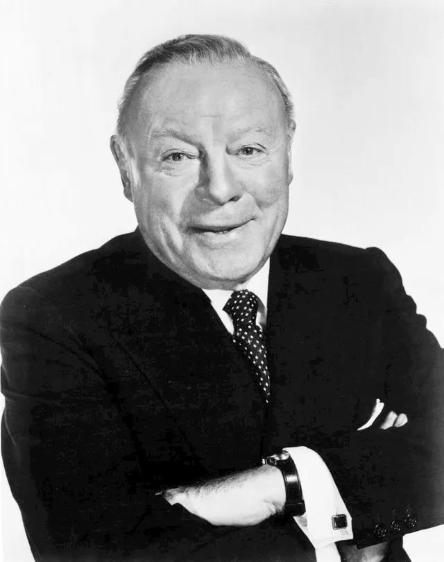 Black-and-white publicity photograph of Edmund Gwenn from 1953, an older man in a jacket and tie.