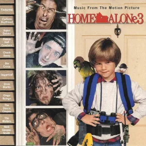 Album front cover: a smiling boy with a parrot on his shoulder and a binocular strap across his chest stands beside a column of four mud-smeared grimacing faces, with a list of featured artists down the left edge.