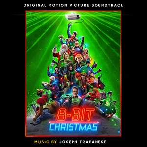 Album cover: a crowd of kids and adults in bright winter clothes piled into the shape of a Christmas tree against a green glowing background, with a games console cartridge as the star on top.