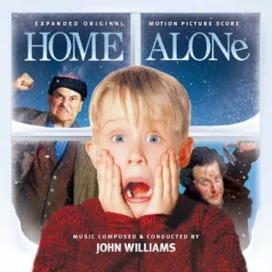 Album cover of a startled boy with hands on his cheeks in a red jumper, framed by a snowy window with two men looking in, and the film title across the top.