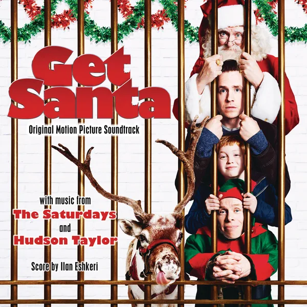 Album sleeve with a large red title on a white brick wall hung with tinsel, and a stack of faces peering through golden bars: a bearded man in a Santa suit, a man, a boy and an elf, with a reindeer licking its nose in front.