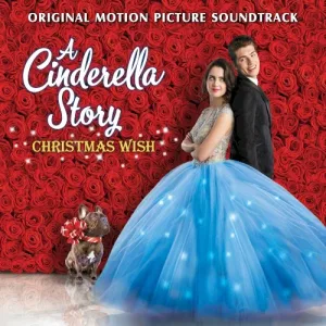 Album cover showing a young woman in a sparkling light blue ball gown standing back to back with a man in a black suit, in front of a wall of red roses, with a small dog in a red bow at the left.