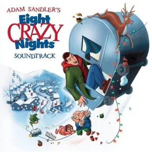 Cartoon album cover: a man in a green coat tumbles from a silver caravan while a reindeer leaps overhead, above a snowy village and a tangle of festive lights.